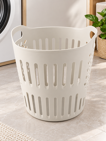 T&CO round ventilated plastic laundry basket and clothes hamper in warm cream with dual ergonomic handles and vertical airflow cutouts
