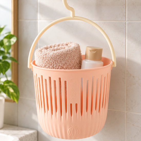 T&CO pastel pink ventilated hanging shower and storage basket with swivel hook holding toiletries 16cm