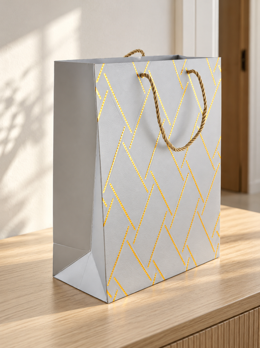 Medium silver basket weave texture metallic gift bag with matching silver rope handles