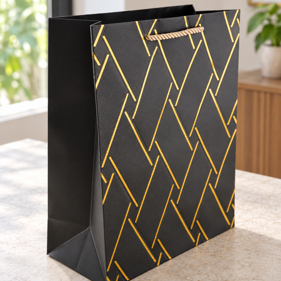 Medium black basket weave texture gift bag with matching twisted black cord handles