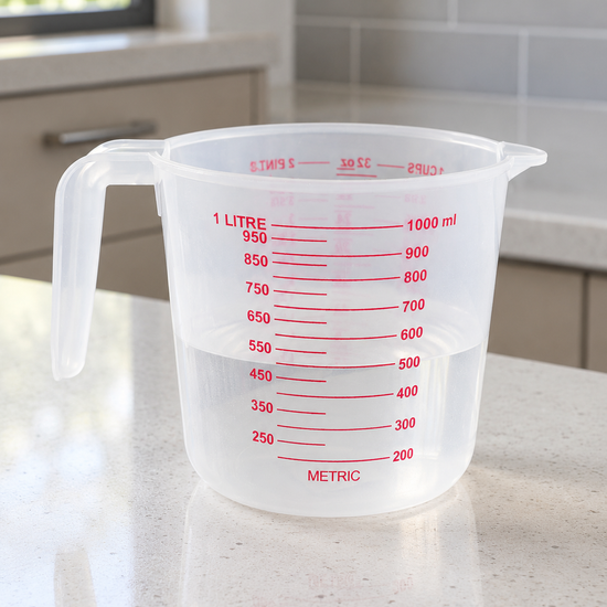 Clear 1L plastic measuring jug with volume graduation marks and pouring spout