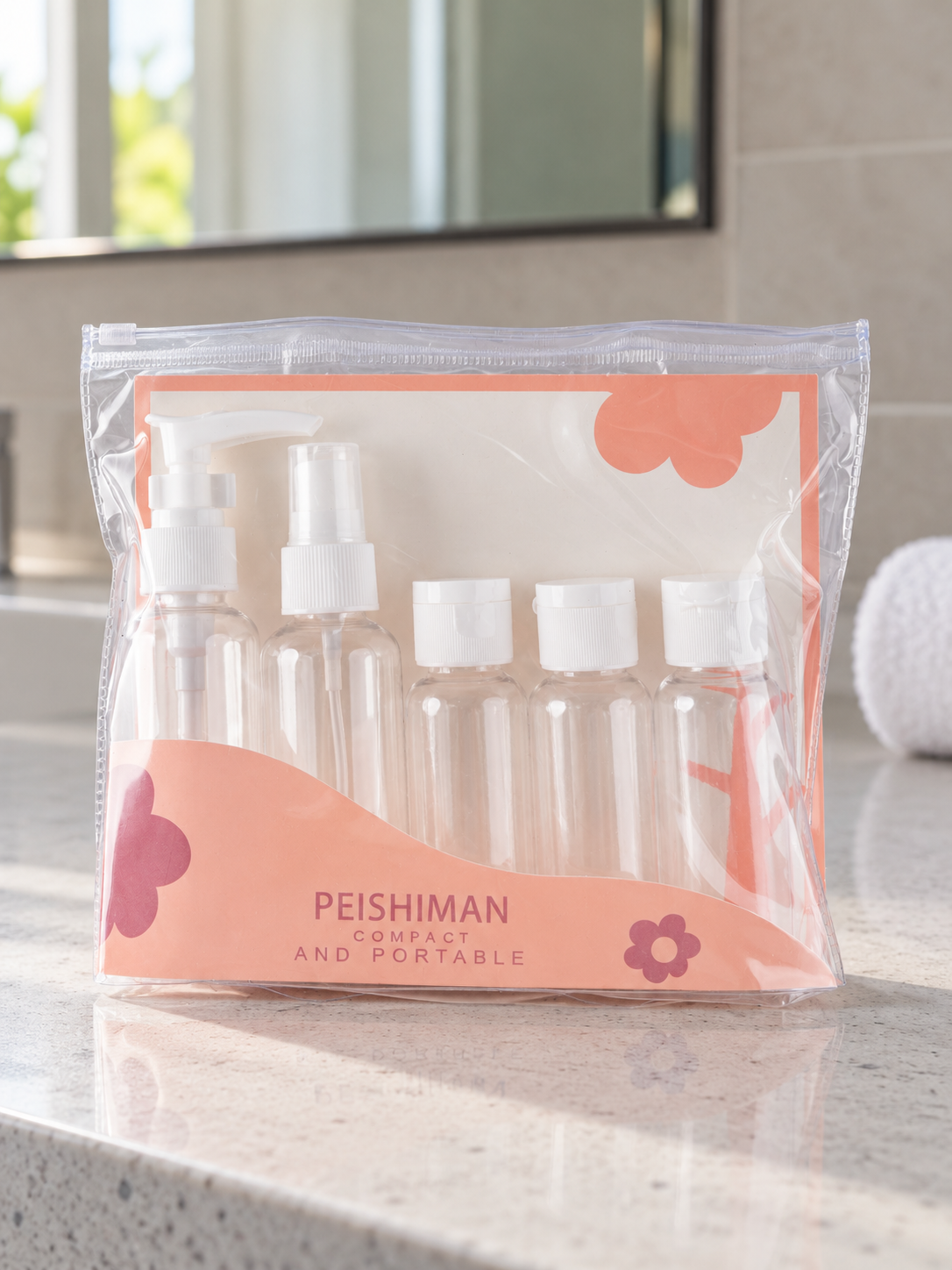 White portable travel toiletry bottle set in a clear waterproof zipper pouch