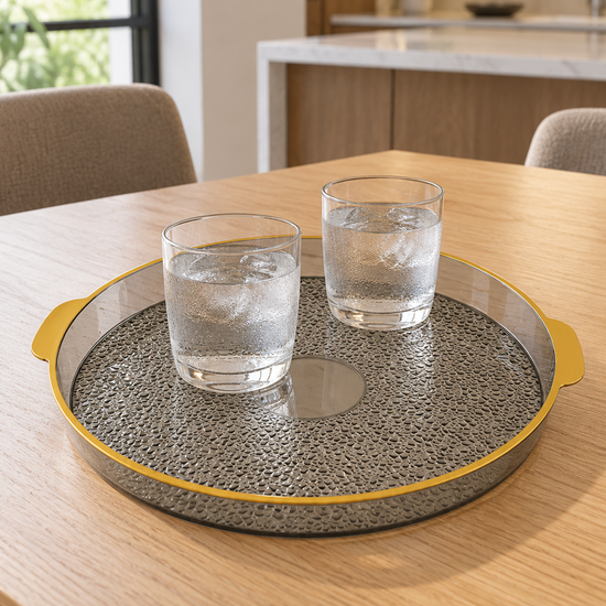 Large round plastic serving platter with deep protective rim angled view