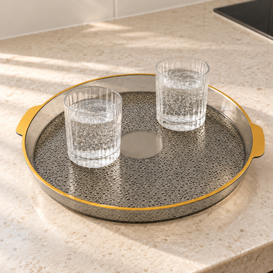 Extra large circular plastic serving platter with raised rim angled view