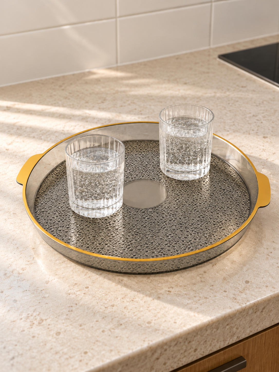 Extra large circular plastic serving platter with raised rim angled view