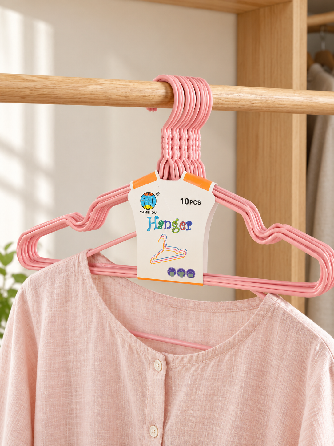 Candy pink plastic kids clothes hangers 10-pack for nursery closet storage