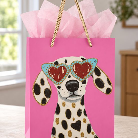 Heart Dotty Dalmatian small bubblegum pink paper gift bag with a Dalmatian wearing turquoise heart sunglasses and sparkling gold spots