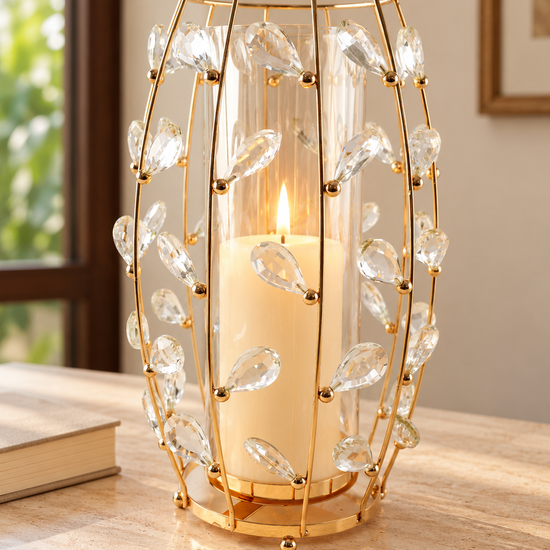Polished gold wire barrel lantern candle holder encrusted with sparkling crystal droplets and clear inner glass hurricane cylinder
