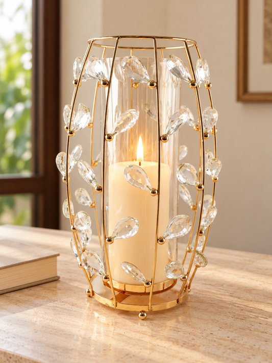 Polished gold wire barrel lantern candle holder encrusted with sparkling crystal droplets and clear inner glass hurricane cylinder