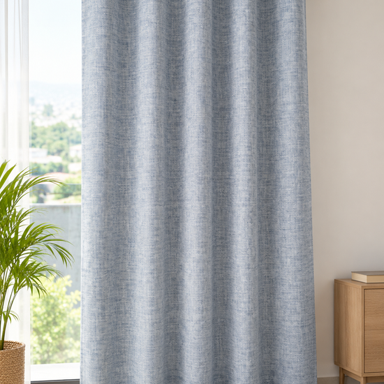Denim blue chambray slub linen look eyelet window curtain panel hung neatly on curtain rod