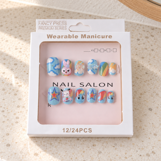 Fancy Press rainbow starburst and bunny 3D charm press on nail set in retail window display