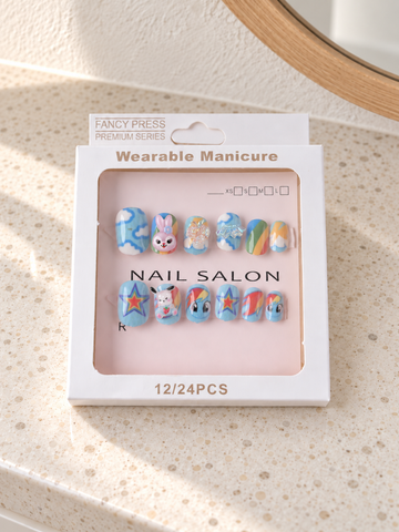 Fancy Press rainbow starburst and bunny 3D charm press on nail set in retail window display