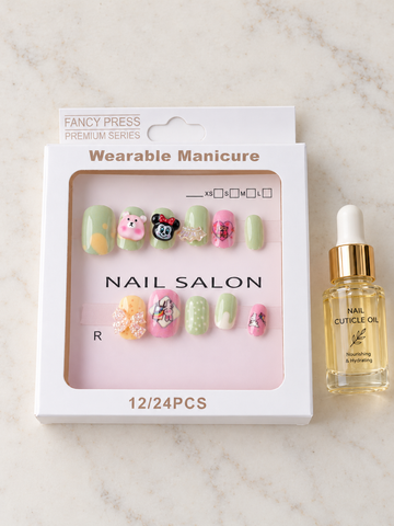 Fancy Press mint green cartoon 3D charm press on nail set with included bottle of nourishing cuticle oil