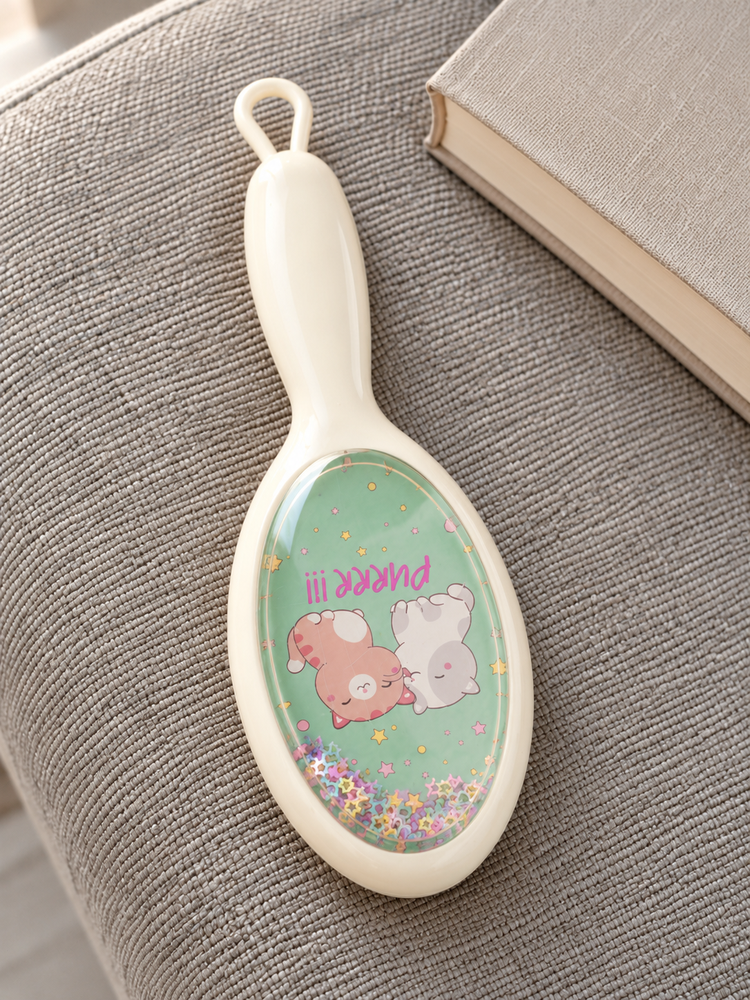 Cream Purrr cuddling kittens glitter shaker cushion paddle hair brush showing sleeping cats and floating stars