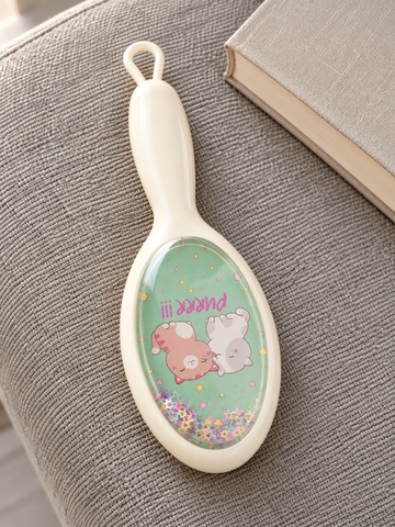 Cream Purrr cuddling kittens glitter shaker cushion paddle hair brush showing sleeping cats and floating stars