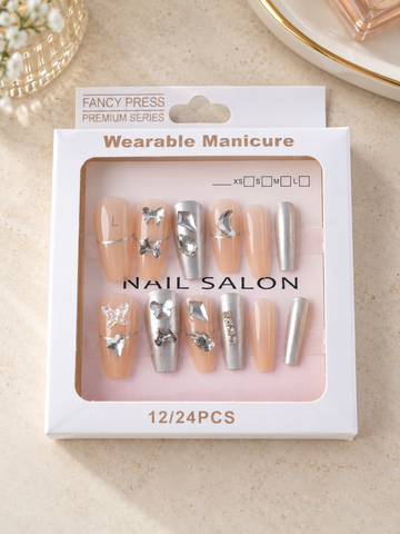 Fancy Press metallic silver chrome and nude coffin press-on nails with 3D silver butterflies and crystal jewels