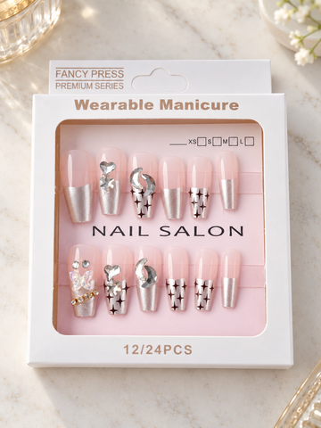 Fancy Press metallic chrome silver French tip coffin press-on nails with sparkle starbursts, crescent moons, and 3D butterfly