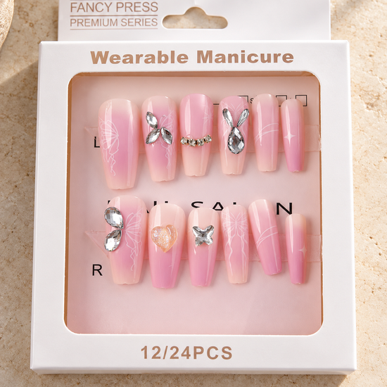 Fancy Press pink aura ombré ballerina press-on nails with white butterfly wings and 3D crystal charms
