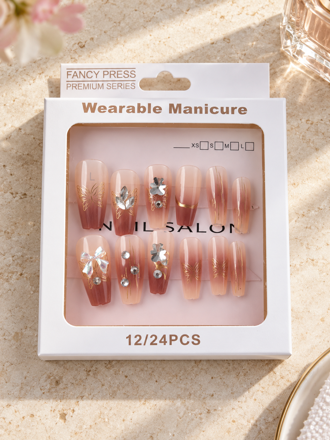 Fancy Press terracotta mocha ombre ballerina press-on nails with gold butterfly art and 3D ribbon bow charm