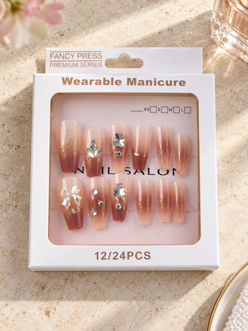 Fancy Press terracotta mocha ombre ballerina press-on nails with gold butterfly art and 3D ribbon bow charm