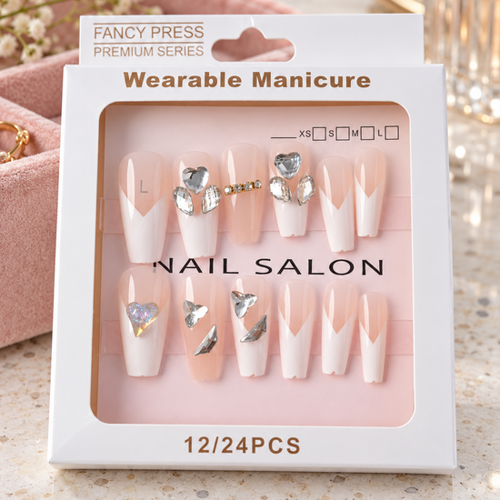 Luxury V-cut French tip coffin press-on nails featuring sparkling rhinestone bar, pearl clusters, and 3D crystal hearts on a natural nude base