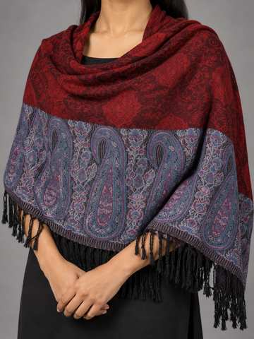 Women's crimson maroon red and slate blue jacquard pashmina shawl featuring smooth woven center field, traditional paisley boteh border, and black fringe tassels