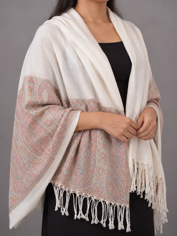 Women's ivory cream cashmere-feel pashmina wrap featuring soft pastel coral and powder blue floral paisley border with delicate white twisted fringe hem
