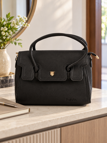 Nuvaara women's structured black grained vegan leather top-handle satchel handbag featuring front flap closure with gold-tone twist clasp and contoured dual handles