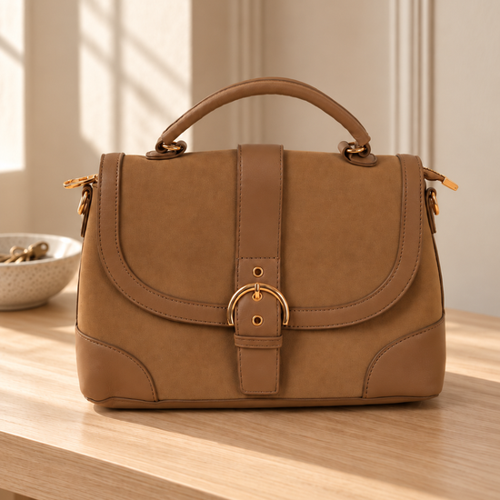 Nuvaara women's structured light brown tan vegan leather shoulder satchel bag featuring curved flap with gold-tone horseshoe buckle and arched top handle