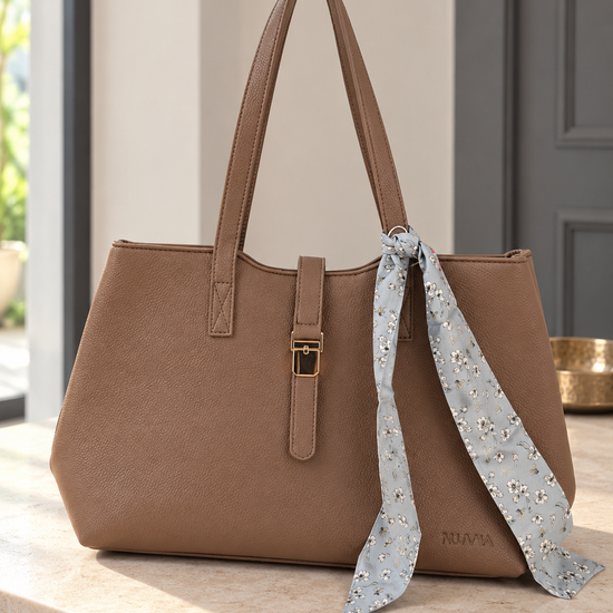 Nuvaara women's warm brown grained vegan leather shoulder tote bag featuring soft floral printed silk twilly scarf accent and gold center clasp