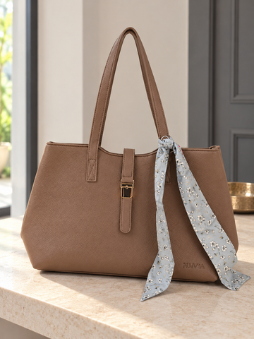 Nuvaara women's warm brown grained vegan leather shoulder tote bag featuring soft floral printed silk twilly scarf accent and gold center clasp