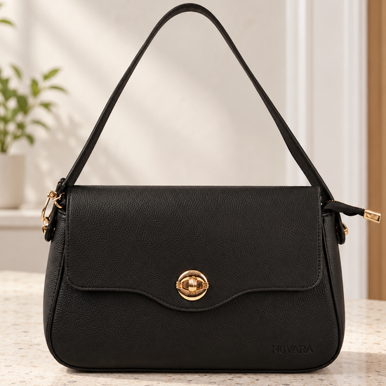 Nuvaara women's classic black pebbled vegan leather shoulder bag featuring a contoured scalloped front flap and ribbed circular gold turn-lock clasp