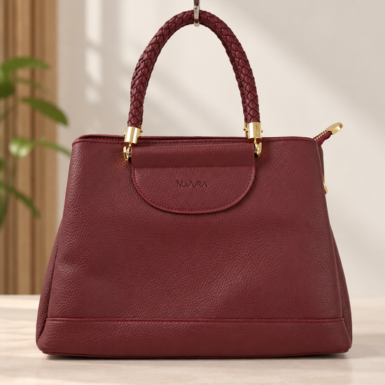 Nuvaara women's wine burgundy pebbled vegan leather satchel tote handbag featuring chunky braided dual handles with gold ferrules and debossed front flap