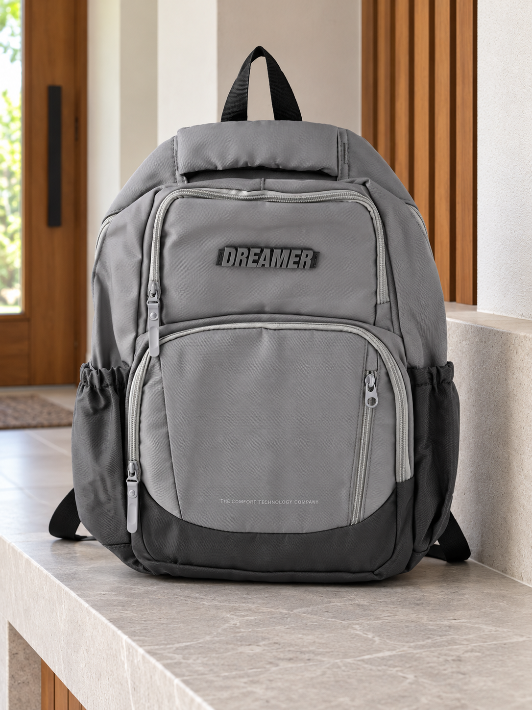 Dreamer multi-pocket ergonomic slate grey water-resistant laptop school backpack with 3D rubber logo badge and padded shoulder straps