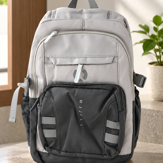 Thilakma tactical system multi-pocket cool grey and dark charcoal laptop backpack with vertical SYSTEM branding and side compression clips