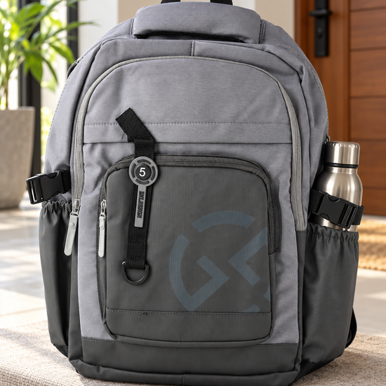 Thilakma BNT Design techwear multi-pocket dove grey and charcoal laptop backpack with geometric logo and BNT DESIGN number 5 tactical strap badge