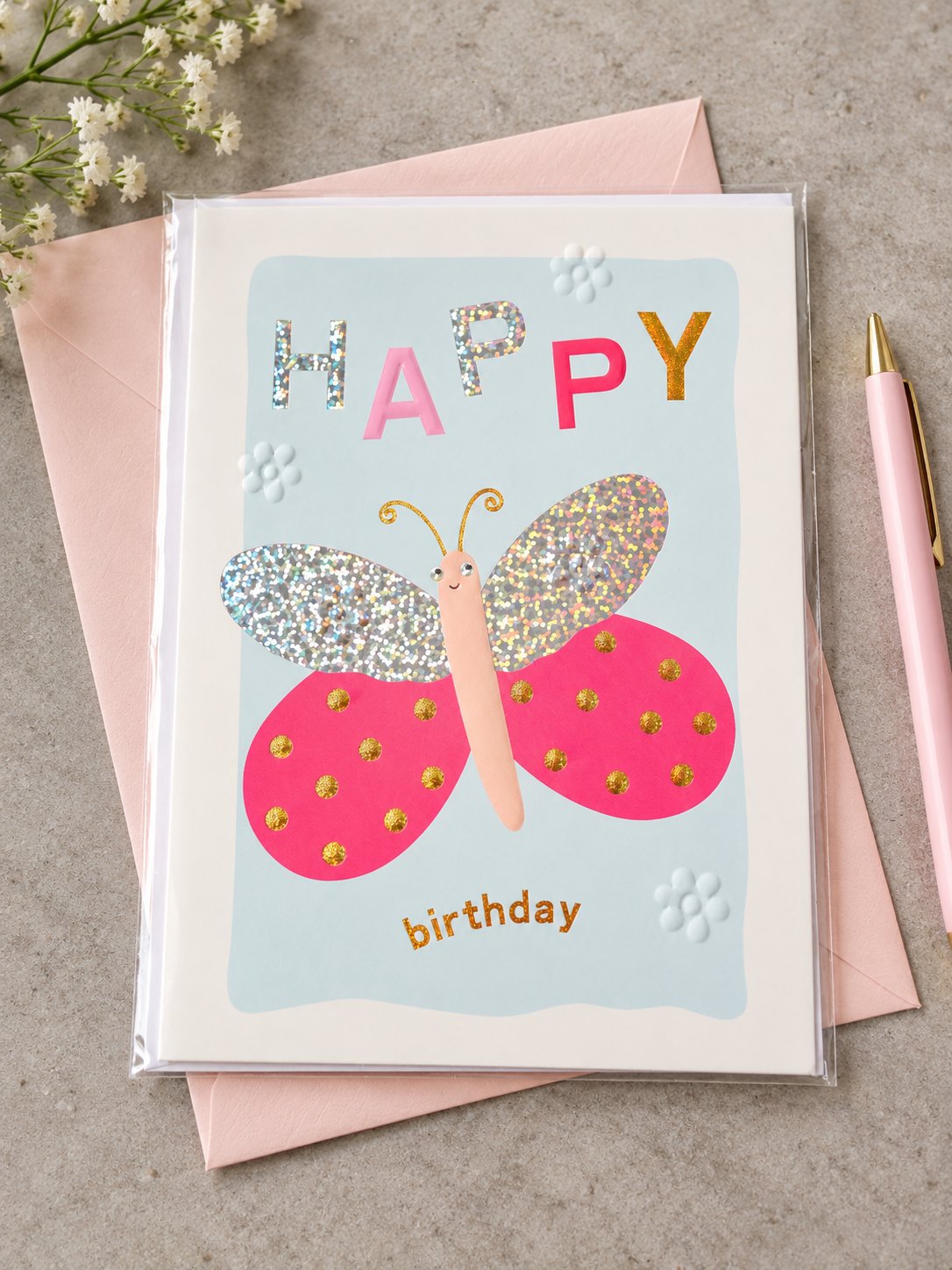 Kids Happy Birthday greeting card featuring a cute butterfly with holographic glitter wings and pink envelope