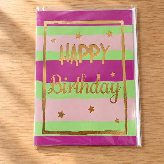 Modern striped birthday greeting card in violet, pink, and mint green with gleaming gold foil frame