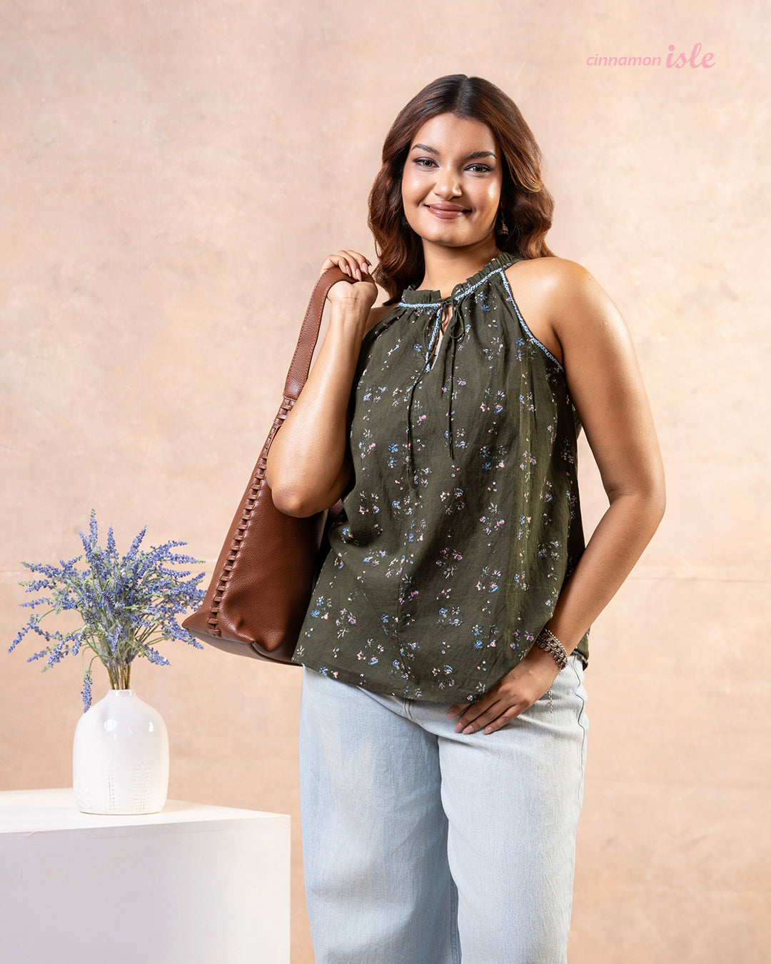 Cinnamon Isle women's olive green halter sleeveless blouse with ditsy floral print and front tie