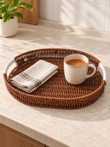 Large Mocha Brown Woven Oval Serving Tray with White Cord-Wrapped Handles Holding Milk Tea Mug and Cloth Napkin