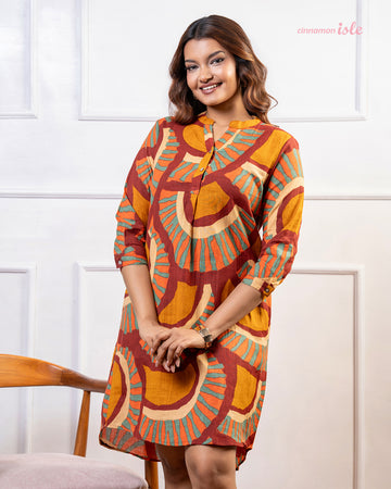 Cinnamon Isle women's rust red and mustard mosaic fan print tunic dress with 3/4 sleeves and collar
