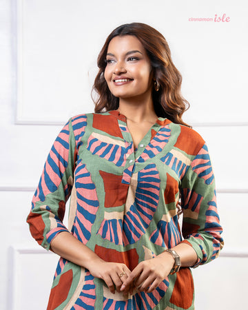 Cinnamon Isle women's olive green and terracotta mosaic print tunic dress with 3/4 sleeves and collar