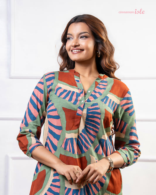 Cinnamon Isle women's olive green and terracotta mosaic print tunic dress with 3/4 sleeves and collar
