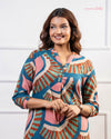 Cinnamon Isle women's teal blue mosaic fan print tunic dress with 3/4 sleeves and mandarin collar