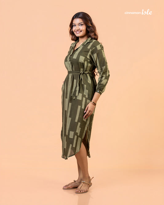 Cinnamon Isle Women's Olive Green Domino Print Belted Shirt Dress full length view showing curved hem and side slit