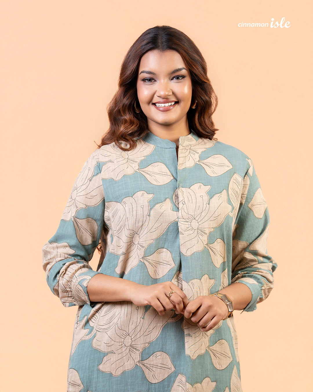Cinnamon Isle Women's Slate Blue Leaf Print Curved Hem Tunic Dress close-up portrait showing mandarin collar